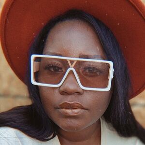 Cream rectangle frame with pink lens